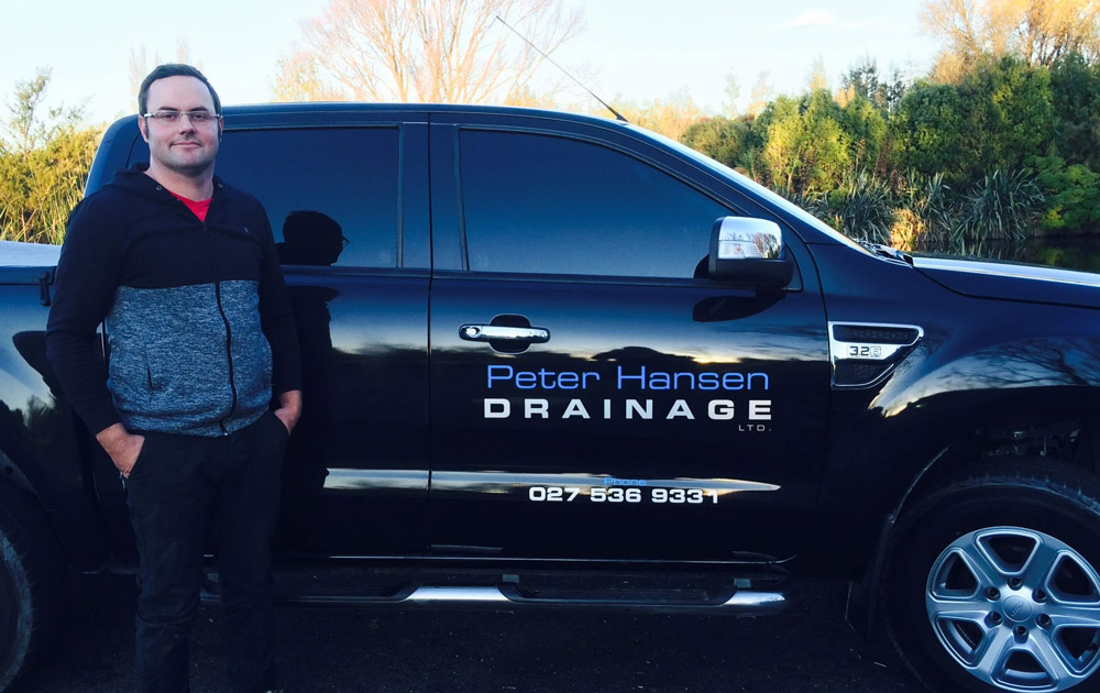 Peter Hansen with Peter Hansen Drainage company vehicle providing blocked drain repair, septic tank maintenance, septic tank services and drainlaying services in Canterbury, New Zealand.